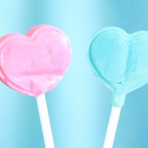 Lollipops of pink and blue for him and her