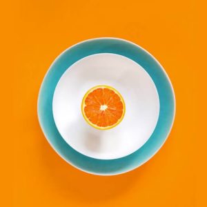Orange fruit on a plate