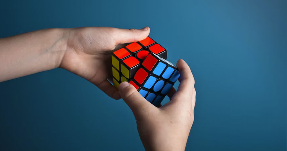 The Rubixs Cube in hands