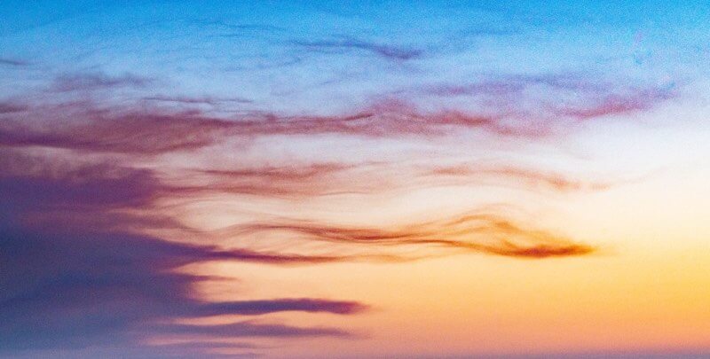 Wavy clouds at the sunset