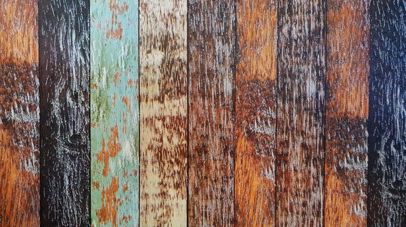 Weathered wooden planks of various colors